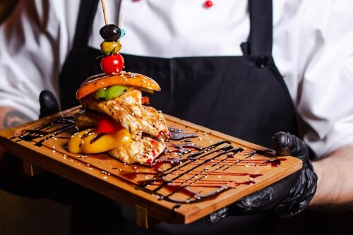 grilled-chicken-breast-served-with-bell-peppers-cherry-tomato-olives-1_140725-8590_thumb